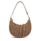 Kangmar is a beautiful shearling handbag which is perfect for carrying your essentials with you, it comes with detachable shoulder strap in skin. Top double zipped closure. Top handle in soft skin with hardware in gold. Adjustable and detachable shoulder strap in leather, 15 mm wide.  Satin lining and flat zipped inner pocket Item comes with a branded dust bag. Embossed Lovelies logo inside the bag.  Gold-toned hardware Measurements W36 X D5 X H20 cm 100 % Australian shearling 