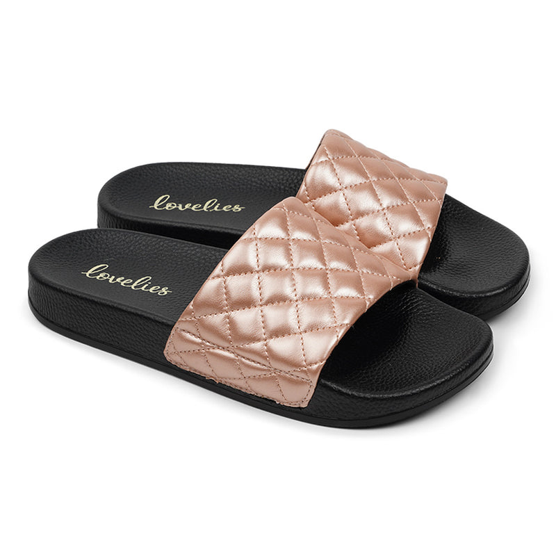Our La Boca slides offer sophisticated style with a hint of modern texture. The quilted vegan leather upper ensures a luxurious look and feel for every step, with a soft cotton lining that provides remarkable comfort.  Slip into these slides and experience a unique combination of fashion-forward style and all-day comfort.  Use them at the beach or at the dance floor . .  Material:  Sole : PU Rubber Lining : Cotton Upper : Vegan leather