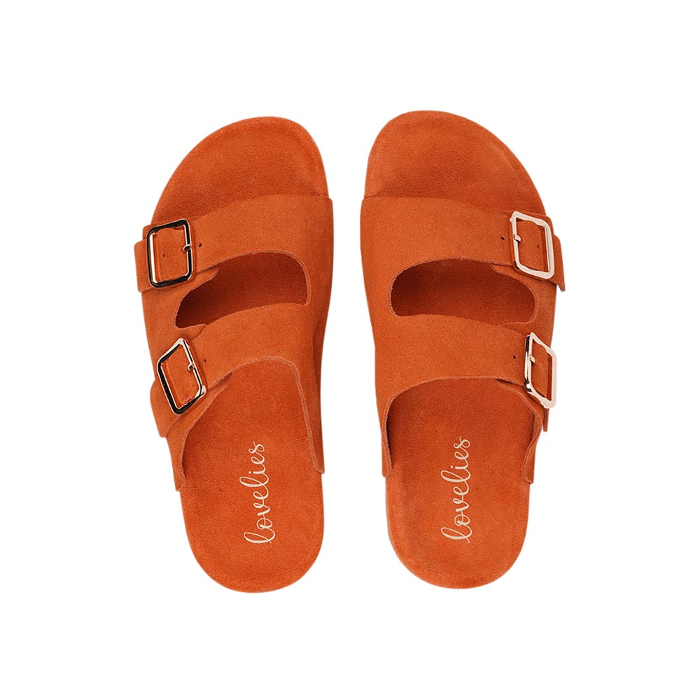 These soft suede leather sandals come with 2 adjustable straps and a full suede covered midsole for the best fit and comfort.  With its delicate and soft fabrics, you feel at ease and elegant at the same time. The easy to-go sandals will fit to your feminine dress or your summer jeans.  Size and fit:  True to size If you are between sizes, we recommend taking the next size up. See our Size Guide  Material:  Outsole / Insole : Rubber  Footbed: Suede leather Lining: Suede leather Upper: Suede leather