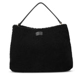 Mainling is a tribute to craftsmanship and the handmade, this large and very soft bag comes in curly shearling and with beautiful leather details. * Top double zipped closure. * Top handle in soft skin with hardware in gold. * Adjustable and detachable shoulder strap in leather, 15 mm wide. * Satin lining and flat zipped inner pocket * Item comes with a branded dust bag. * Embossed Lovelies logo on the front. * Gold-toned hardware * Messurements W40 X D10 X H30 cm * 100 % Australian shearling
