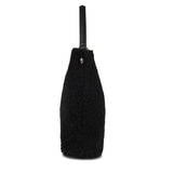 Mainling is a tribute to craftsmanship and the handmade, this large and very soft bag comes in curly shearling and with beautiful leather details. * Top double zipped closure. * Top handle in soft skin with hardware in gold. * Adjustable and detachable shoulder strap in leather, 15 mm wide. * Satin lining and flat zipped inner pocket * Item comes with a branded dust bag. * Embossed Lovelies logo on the front. * Gold-toned hardware * Messurements W40 X D10 X H30 cm * 100 % Australian shearling