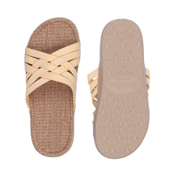 Discover the captivating Matara sandal from Lovelies Studio. This sumptuous sandal is composed of luxuriantly soft and resilient gum rubber, with a natural jute innersole. The closely woven cotton straps infuse a delicate and fanciful aesthetic, providing an effortless sophistication for any ensemble.  With its delicate and soft fabrics, you feel at ease and elegant at the same time. The easy to-go sandals with their striking summer colors are a perfect fit to your feminine summer dresses 