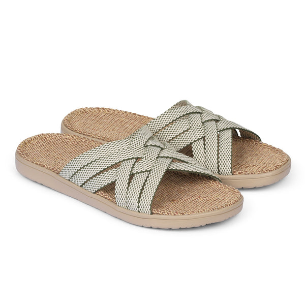 Discover the captivating Matara sandal from Lovelies Studio. This sumptuous sandal is composed of luxuriantly soft and resilient gum rubber, with a natural jute innersole. The closely woven cotton straps infuse a delicate and fanciful aesthetic, providing an effortless sophistication for any ensemble.  With its delicate and soft fabrics, you feel at ease and elegant at the same time. The easy to-go sandals with their striking summer colors are a perfect fit to your feminine summer dresses 