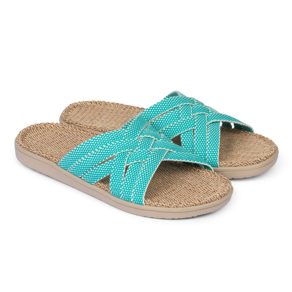 Discover the captivating Matara sandal from Lovelies Studio. This sumptuous sandal is composed of luxuriantly soft and resilient gum rubber, with a natural jute innersole. The closely woven cotton straps infuse a delicate and fanciful aesthetic, providing an effortless sophistication for any ensemble.  With its delicate and soft fabrics, you feel at ease and elegant at the same time. The easy to-go sandals with their striking summer colors are a perfect fit to your feminine summer dresses 