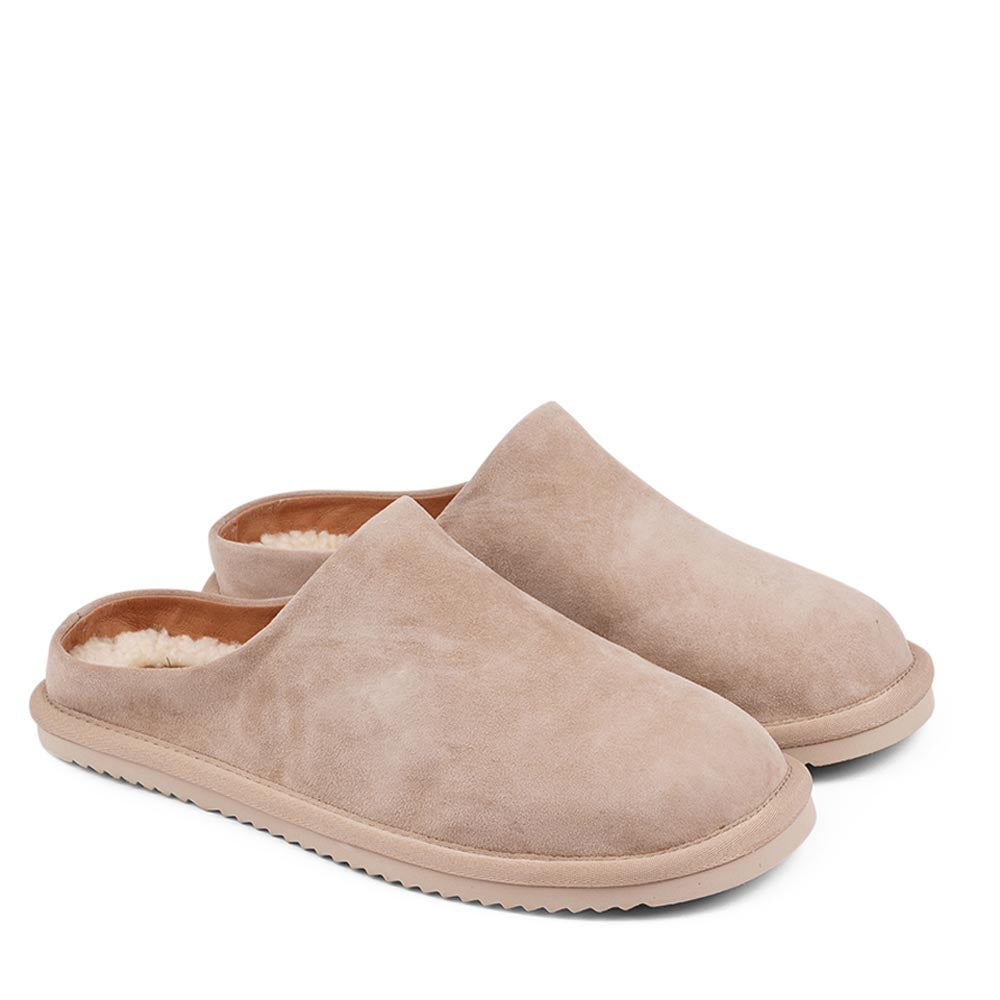 Lovelies calf suede mules will bring softness and warmth to your feet this summer. The combination of soft curly shearling and the durable rubber sole guarantees the utmost comfort to the wearer.  Size and fit:  True to size If you are between sizes, we recommend taking the next size up. Material:  Outsole / Insole : Rubber  Footbed: Shearling Lining:  Leather Upper: Calf suede LWG Environmental GOLD RATED Certification