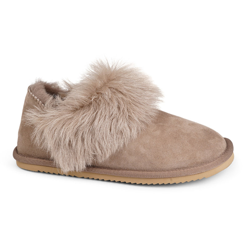 Soft and cosy shearling slippers  Lovelies shearling slippers are the essence of comfortability. When you’re in the need of surrounding your feet in soft and warm slippers, Lovelies shearling slippers are the answer. With soft and durable soles, warm shearling and a gorgeous design, you’ll never want to wear any other home-shoe to make you feel at ease.