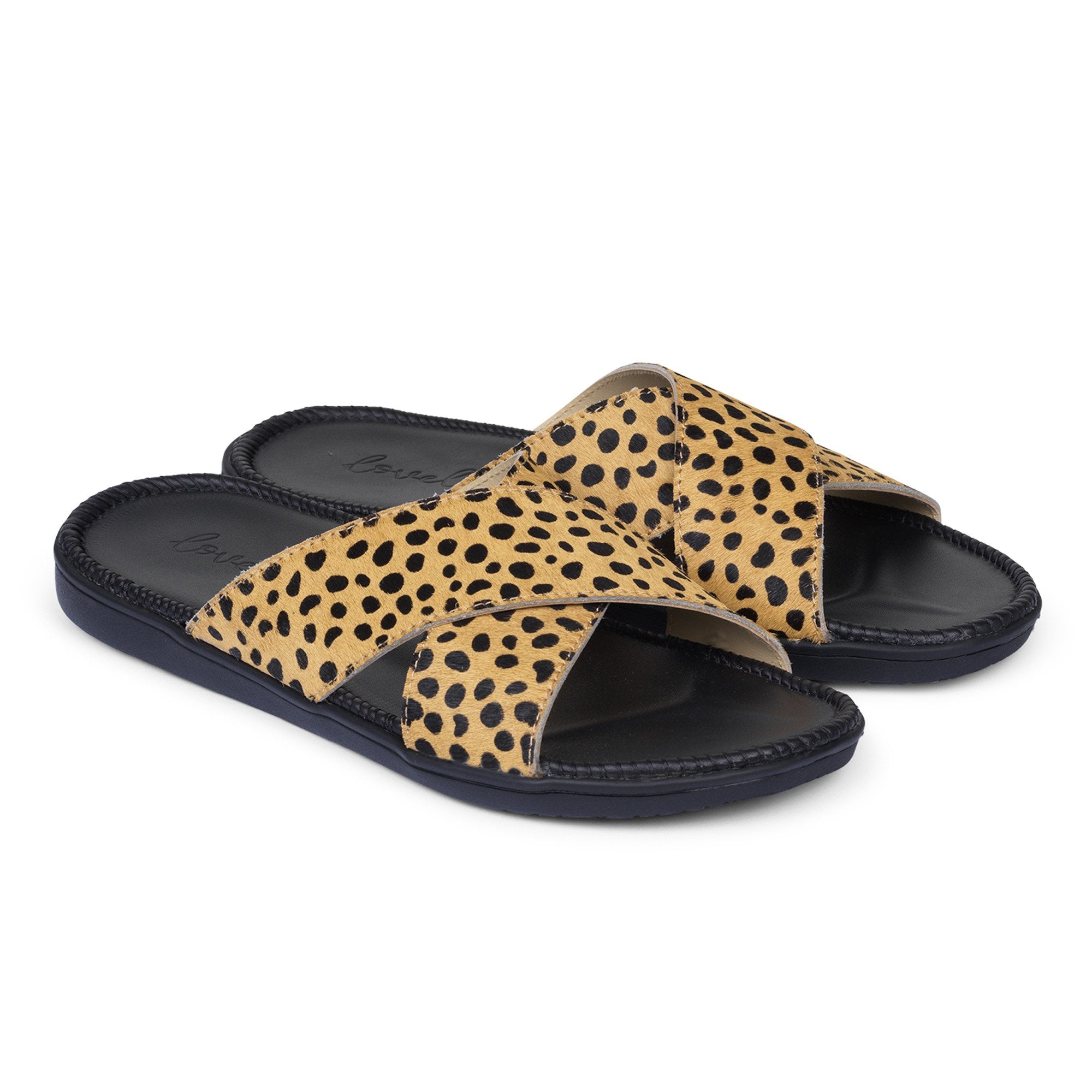 Sandals with 2 crossing straps of leather. The comfortable inner sole in covered with soft black leather.