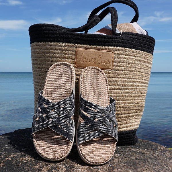 Discover the captivating Matara sandal from Lovelies Studio. This sumptuous sandal is composed of luxuriantly soft and resilient gum rubber, with a natural jute innersole. The closely woven cotton straps infuse a delicate and fanciful aesthetic, providing an effortless sophistication for any ensemble.  With its delicate and soft fabrics, you feel at ease and elegant at the same time. The easy to-go sandals with their striking summer colors are a perfect fit to your feminine summer dresses 