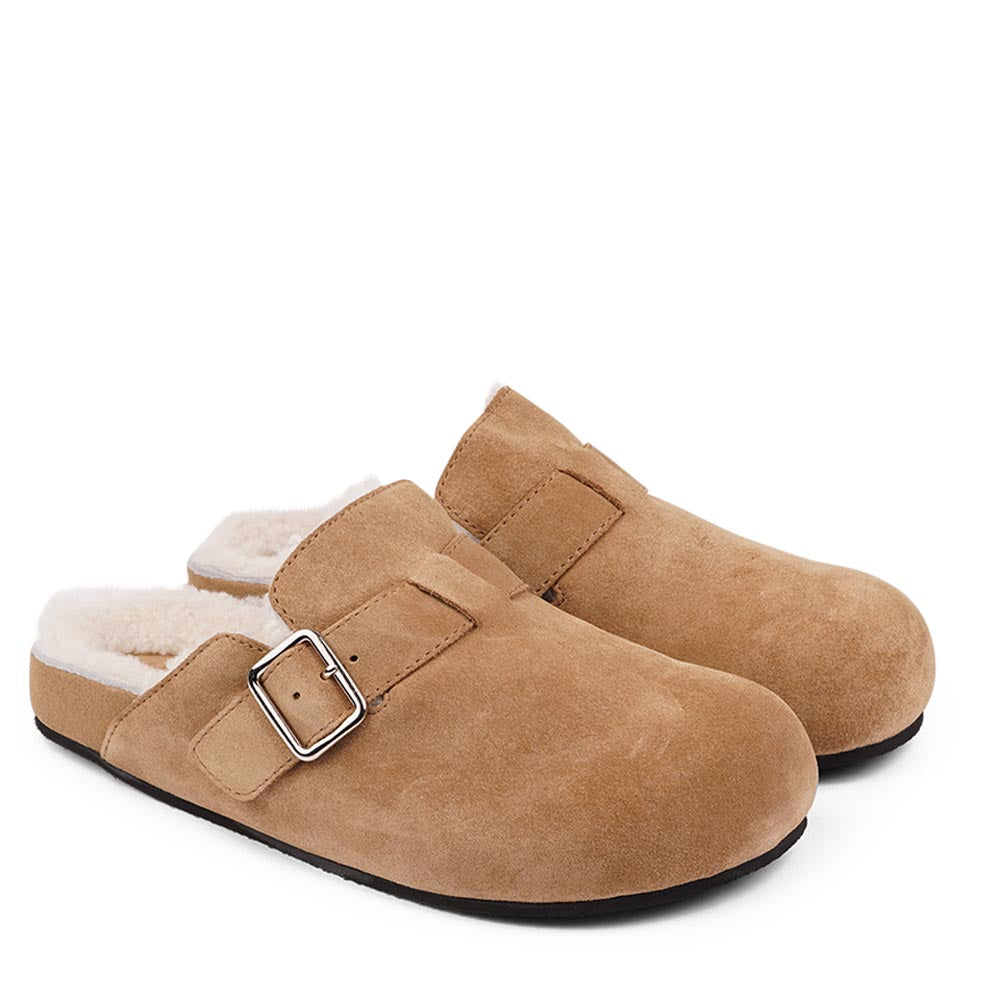 Suede Mules with adjustable buckle and curly shearling lining  Lovelies shearling mules will bring softness and warmth to your feet this summer. The combination of soft curly shearling and the durable rubber sole guarantees the utmost comfort to the wearer. Nesso Mules in Sand from Danish Lovelies Studio.