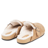 Suede Mules with adjustable buckle and curly shearling lining  Lovelies shearling mules will bring softness and warmth to your feet this summer. The combination of soft curly shearling and the durable rubber sole guarantees the utmost comfort to the wearer. Nesso Mules in Sand from Danish Lovelies Studio.
