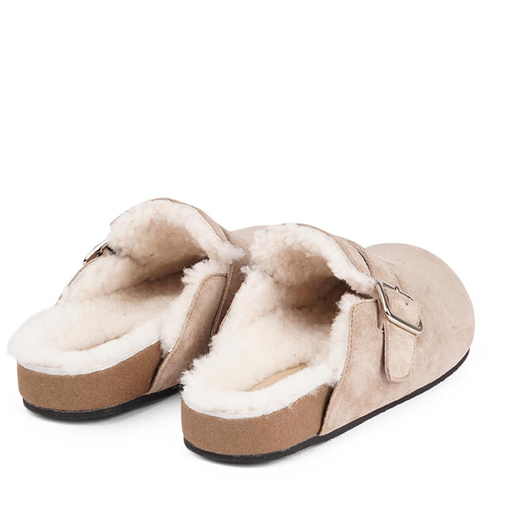 Suede Mules with adjustable buckle and curly shearling lining  Lovelies shearling mules will bring softness and warmth to your feet this summer. The combination of soft curly shearling and the durable rubber sole guarantees the utmost comfort to the wearer. Nesso Mules in Taupe from Danish Lovelies Studio.