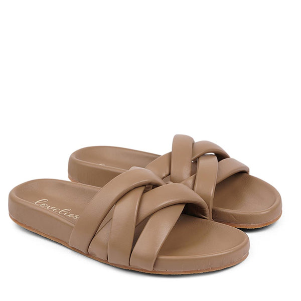 These soft nappa leather sandals come with 4 puffy leather straps for the best fit, comfort and style  With its delicate and soft fabrics, you feel at ease and elegant at the same time. The easy to-go sandals will fit to your feminine dress or your summer jeans.  Size and fit:  True to size If you are between sizes, we recommend taking the next size up. See our Size Guide  Material:  Outsole / Insole : Rubber  Footbed: Nappa leather Lining: Nappa leather Upper: Nappa leather