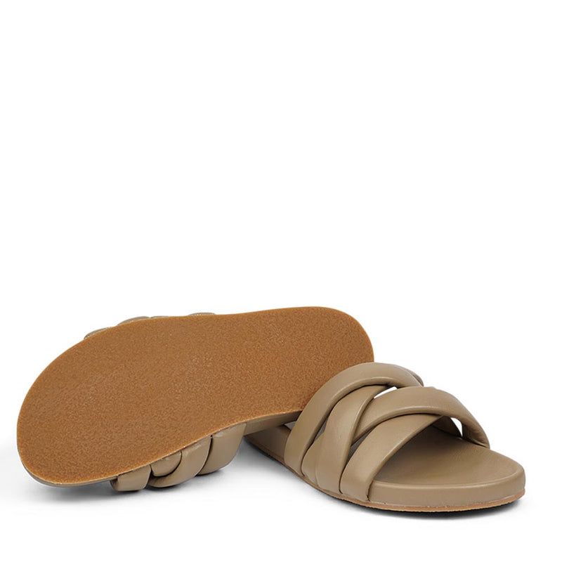 These soft nappa leather sandals come with 4 puffy leather straps for the best fit, comfort and style  With its delicate and soft fabrics, you feel at ease and elegant at the same time. The easy to-go sandals will fit to your feminine dress or your summer jeans.  Size and fit:  True to size If you are between sizes, we recommend taking the next size up. See our Size Guide  Material:  Outsole / Insole : Rubber  Footbed: Nappa leather Lining: Nappa leather Upper: Nappa leather