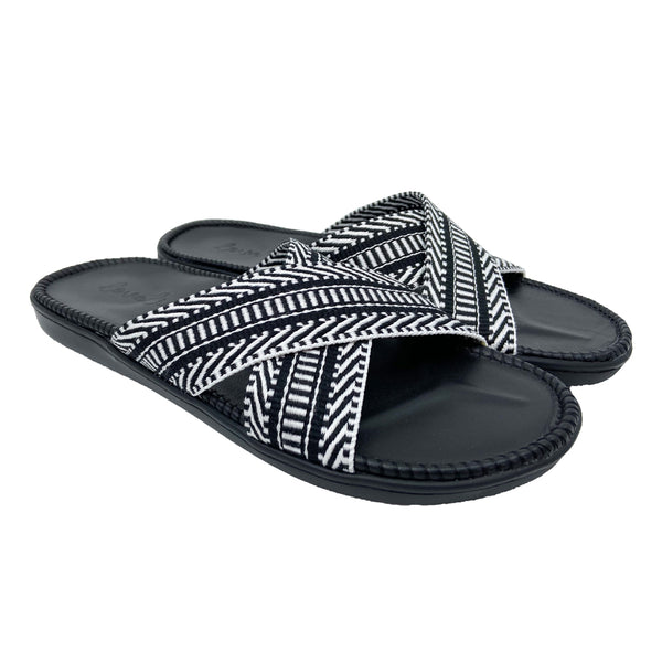 Lovelies Studio - Introducing the Phi Phi sandal, a tribute to the mesmerizing Thai beach known for its crystalline blue waters.  Elevate your style and comfort with this exquisite footwear. The Phi Phi sandal features double-layered soft and durable rubber soles, ensuring every step is a cushioned delight. The mid-sole, adorned with natural jute, adds a touch of earthy elegance.