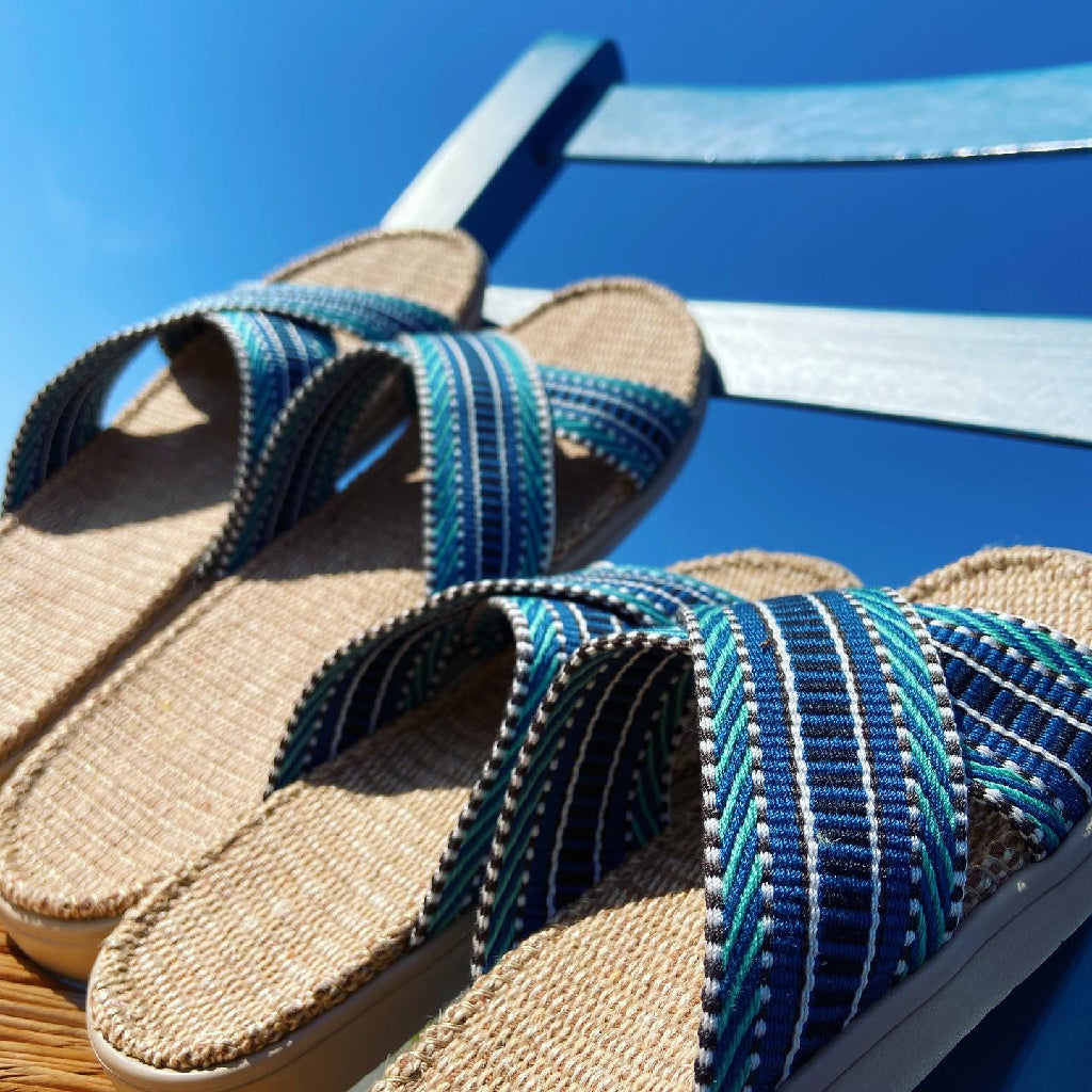 Summer sandals for kids from danish brand Lovelies. The rubber sole is nice and soft which makes the sandal very comfortable. The inner sole is covered with woven jute and the straps are med of fine cotton.