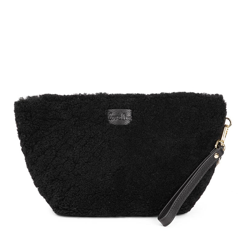 Rawu is a cool shearling clutch which is perfect for carrying your essentials with you. Rawu is hand made from the finest curly shearling from Australia * Top magnet closing * Detachable wrist strap * Adjustable and detachable shoulder strap in leather (15 mm) * Skin lining and flat zipped inner pocket * Item comes with a branded dust bag. * Embossed Lovelies logo on the front. * Gold-toned hardware * Messurements W30 X D12 X H18 cm * 100 % Australian shearling.