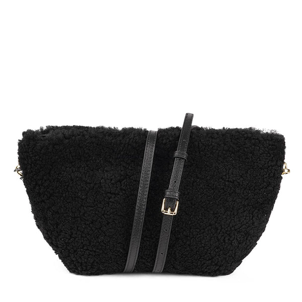 Rawu is a cool shearling clutch which is perfect for carrying your essentials with you. Rawu is hand made from the finest curly shearling from Australia * Top magnet closing * Detachable wrist strap * Adjustable and detachable shoulder strap in leather (15 mm) * Skin lining and flat zipped inner pocket * Item comes with a branded dust bag. * Embossed Lovelies logo on the front. * Gold-toned hardware * Messurements W30 X D12 X H18 cm * 100 % Australian shearling.