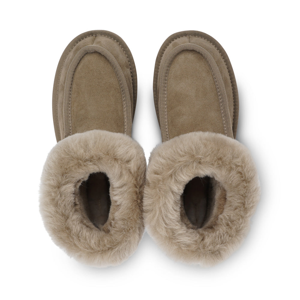 Soft and cosy shearling slippers   Lovelies shearling slippers are the essence of comfortability. When you’re in the need of surrounding your feet in soft and warm slippers, Lovelies shearling slippers are the answer. With soft and durable soles, warm shearling and a gorgeous design, you’ll never want to wear any other home-shoe to make you feel at ease.