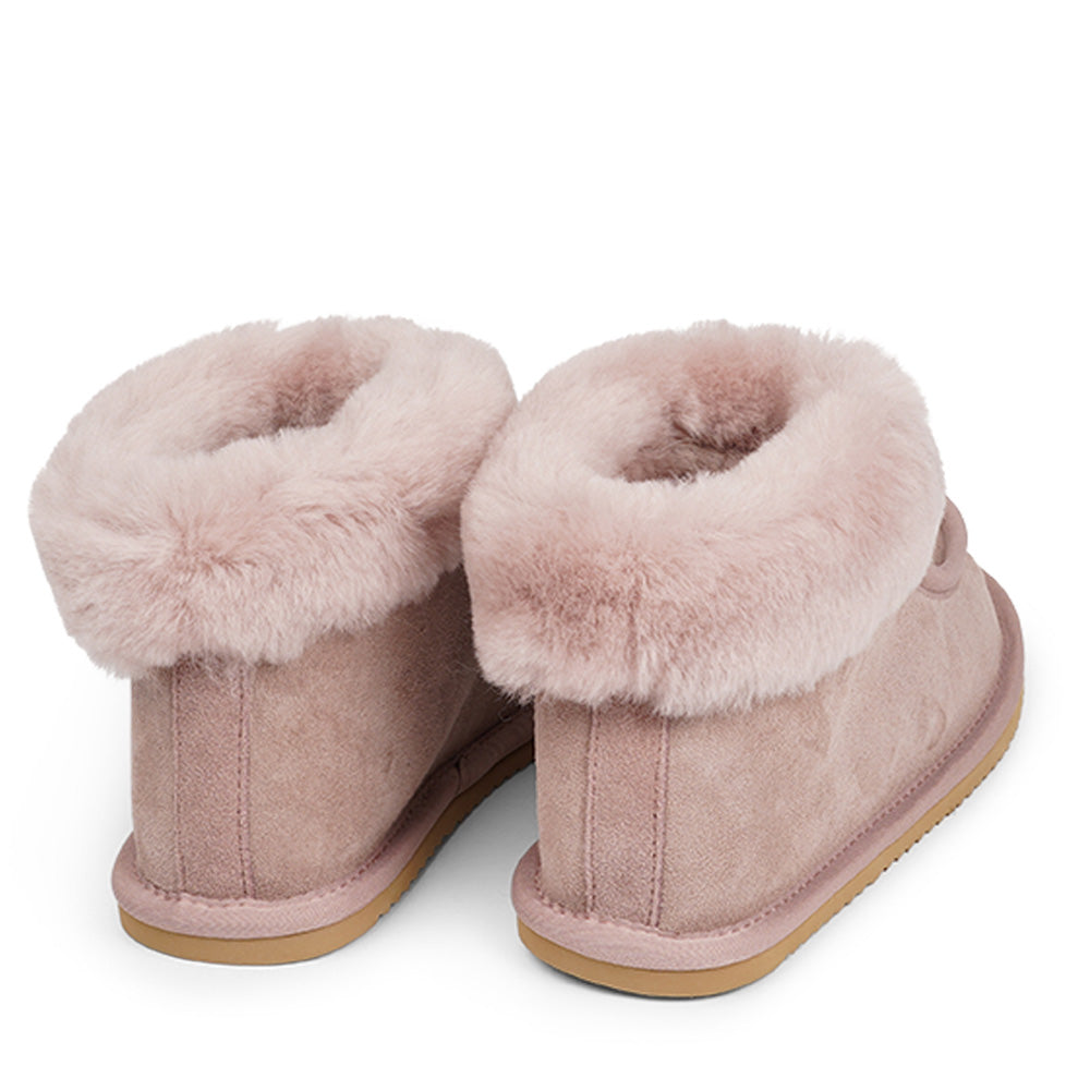 Lovelies shearling high slippers are the essence of comfortability. When you’re in the need of surrounding your feet in soft and warm slippers, Lovelies shearling slippers are the answer. With soft and durable soles, warm shearling and a gorgeous design, you’ll never want to wear any other home-shoe to make you feel at ease.