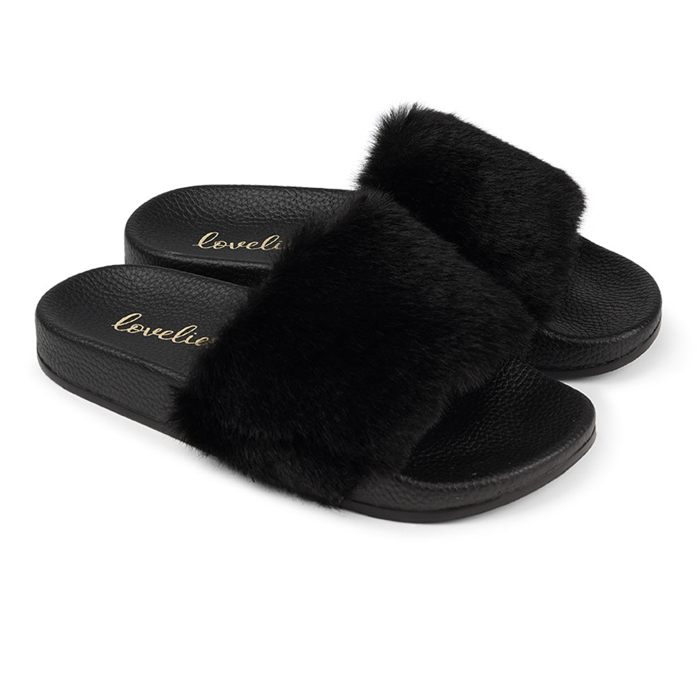 Lovelies Studio Denmark -  Exclusive slides with faux fur. Beautiful and feminine faux fur slides.  The soft rubber sole is light and very comfortable.   We are proud member of 1% for the planet  Enjoy your Lovelies  Material:  Sole : PU   Rubber Lining: Cotton Upper: Faux fur