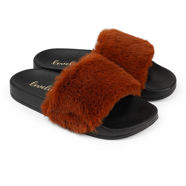 Lovelies Studio Denmark -  Exclusive slides with faux fur. Beautiful and feminine faux fur slides.  The soft rubber sole is light and very comfortable.   We are proud member of 1% for the planet  Enjoy your Lovelies  Material:  Sole : PU   Rubber Lining: Cotton Upper: Faux fur Summer slides in black and rust