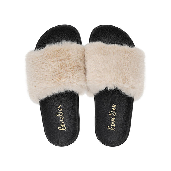 Lovelies Studio Denmark -  Exclusive slides with faux fur. Beautiful and feminine faux fur slides.  The soft rubber sole is light and very comfortable.   We are proud member of 1% for the planet  Enjoy your Lovelies  Material:  Sole : PU   Rubber Lining: Cotton Upper: Faux fur Summer slides in black and  ivory