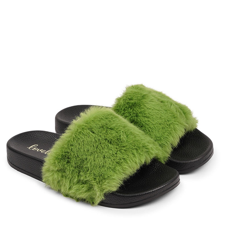 Lovelies Studio Denmark -  Exclusive slides with faux fur. Beautiful and feminine faux fur slides.  The soft rubber sole is light and very comfortable.   We are proud member of 1% for the planet  Enjoy your Lovelies  Material:  Sole : PU   Rubber Lining: Cotton Upper: Faux fur Summer slides in black and   pink