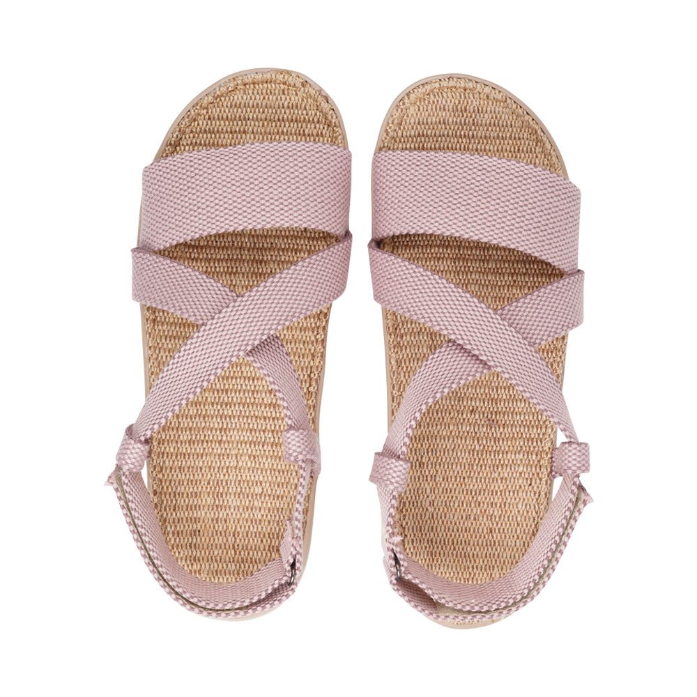 Tupim, with velcro heel strap and a soft natural jute sole. Really good fit, hold and comfort. Once you’ve tried Lovelies’ summer sandals you’ll never want to wear any other footwear. With its delicate and soft fabrics, you feel at ease and elegant at the same time. The easy to-go sandals with their striking summer colours are a perfect fit to your feminine summer dresses and your light blue summer jeans. We are proud members of 1% For the planet. Enjoy your Lovelies!