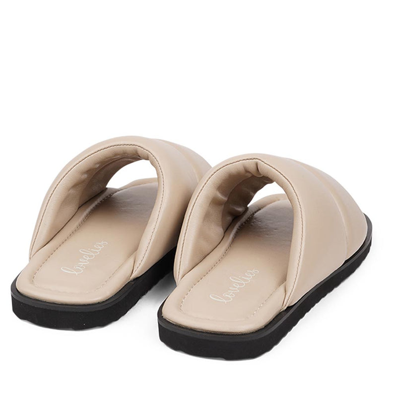 Lovelies Studio - Vesime sandals. Feminine and comfortable nappa leather sandals with a super puffy wide strap.  With its delicate and soft fabrics, you feel at ease and elegant at the same time. The easy to-go sandals will fit to your feminine dress or your summer jeans.  Size and fit:  True to size If you are between sizes, we recommend taking the next size up. See our Size Guide  Material:  Outsole / Insole : Rubber  Footbed: Nappa leather Lining: Nappa leather Upper: Nappa leather