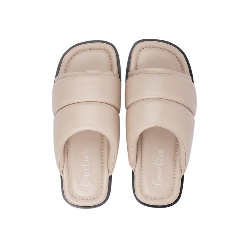 Lovelies Studio - Vesime sandals. Feminine and comfortable nappa leather sandals with a super puffy wide strap.  With its delicate and soft fabrics, you feel at ease and elegant at the same time. The easy to-go sandals will fit to your feminine dress or your summer jeans.  Size and fit:  True to size If you are between sizes, we recommend taking the next size up. See our Size Guide  Material:  Outsole / Insole : Rubber  Footbed: Nappa leather Lining: Nappa leather Upper: Nappa leather