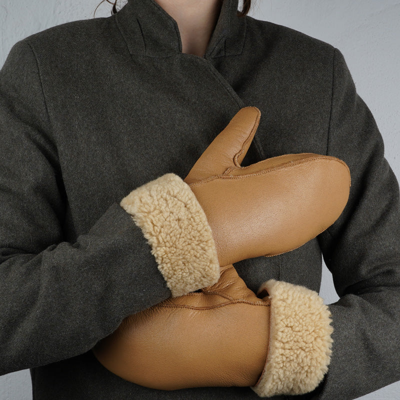 Lovelies Studio - The trendy Vinson mittens are made of 100% Australian shearling.  The palm and upper are soft sheep skin and the beautiful cuff and the lining are curly sheep fur. The thumb is made with only one side sawing for the best comfort and style.  Our Colon mittens are extra long which means that you can fold and wear them in 4 different ways.