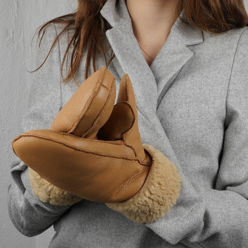Lovelies Studio - The trendy Vinson mittens are made of 100% Australian shearling.  The palm and upper are soft sheep skin and the beautiful cuff and the lining are curly sheep fur. The thumb is made with only one side sawing for the best comfort and style.  Our Colon mittens are extra long which means that you can fold and wear them in 4 different ways.