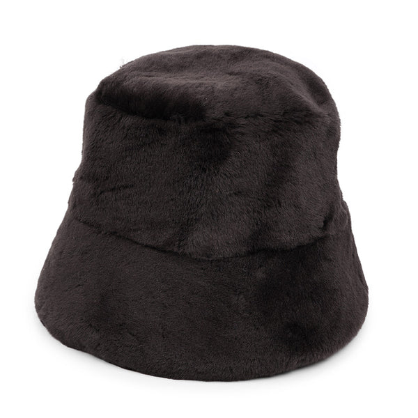 Lovelies Studio, the Danish brand. The cool Whitney shearling bucket hat is made of beautiful soft sheep fur both inside and outside.  Made with 100% Sheepskin. This incredible material balances form with function, offering a chic look with lightweight insulation in the winter and temperature regulation when spring arrives. 