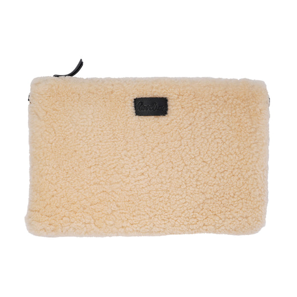 Lovelies Studio Wujii is a large shearling clutch which has room enough for your Ipad and notebooks . Wujii is hand made from the finest curly shearling from Australia.  Top zipped closing   Detachable wrist strap   Satin lining and flat zipped inner pocket   Item comes with a branded dust bag.   Embossed Lovelies logo on the front   Gold-toned hardware   Measurements W34 X D2 X H22 cm   100 % Australian curly shearling 