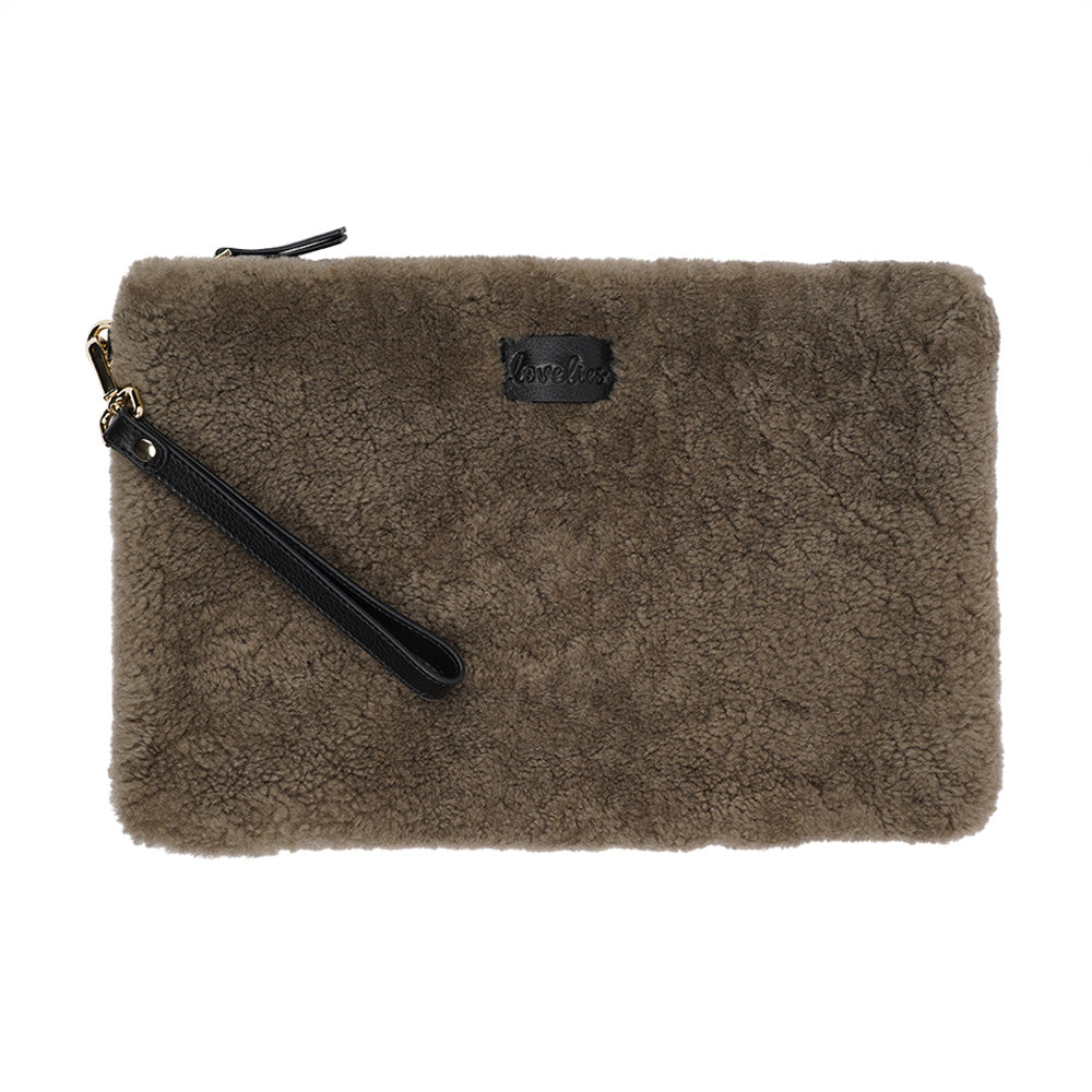 Lovelies Studio Wujii is a large shearling clutch which has room enough for your Ipad and notebooks . Wujii is hand made from the finest curly shearling from Australia.  Top zipped closing   Detachable wrist strap   Satin lining and flat zipped inner pocket   Item comes with a branded dust bag.   Embossed Lovelies logo on the front   Gold-toned hardware   Measurements W34 X D2 X H22 cm   100 % Australian curly shearling 