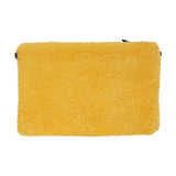 Lovelies Studio Wujii is a large shearling clutch which has room enough for your Ipad and notebooks . Wujii is hand made from the finest curly shearling from Australia.  Top zipped closing   Detachable wrist strap   Satin lining and flat zipped inner pocket   Item comes with a branded dust bag.   Embossed Lovelies logo on the front   Gold-toned hardware   Measurements W34 X D2 X H22 cm   100 % Australian curly shearling 