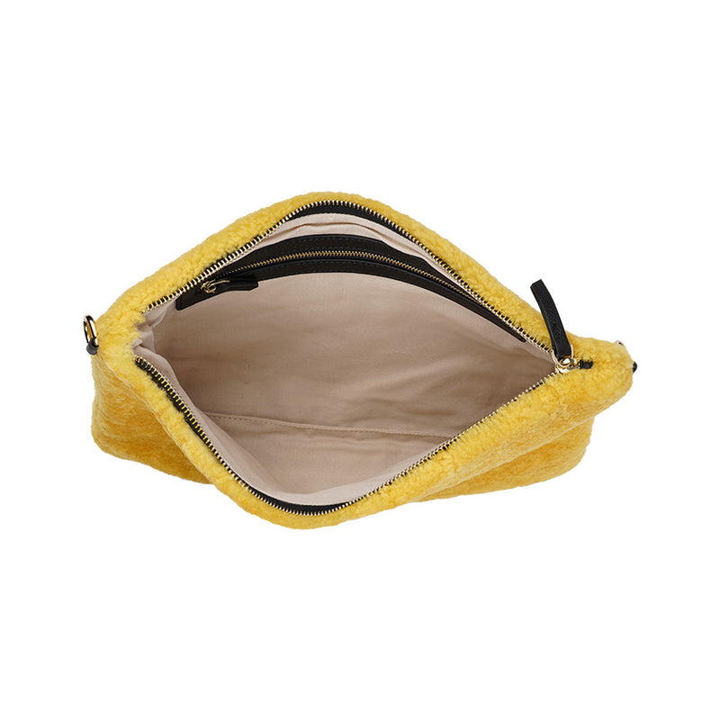 Lovelies Studio Wujii is a large shearling clutch which has room enough for your Ipad and notebooks . Wujii is hand made from the finest curly shearling from Australia.  Top zipped closing   Detachable wrist strap   Satin lining and flat zipped inner pocket   Item comes with a branded dust bag.   Embossed Lovelies logo on the front   Gold-toned hardware   Measurements W34 X D2 X H22 cm   100 % Australian curly shearling 