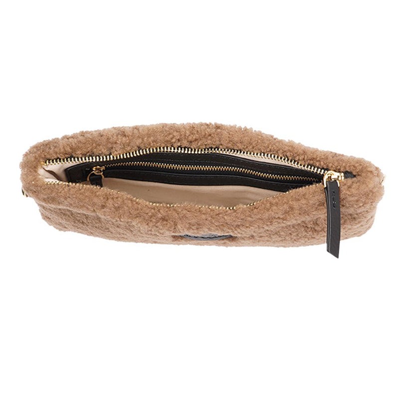Lovelies Studio _ Wuttu is a mini clutch with a detachable wrist strap and is perfect for carrying your essentials with you. Wuttu is hand made from the finest curly shearling from Australia.   Top zipped closing   Detachable wrist strap   Satin lining and flat zipped inner pocket   Item comes with a branded dust bag.   Embossed Lovelies logo on the front   Gold-toned hardware   Measurements W26 X D2 X H12 cm   100 % Australian curly shearling 