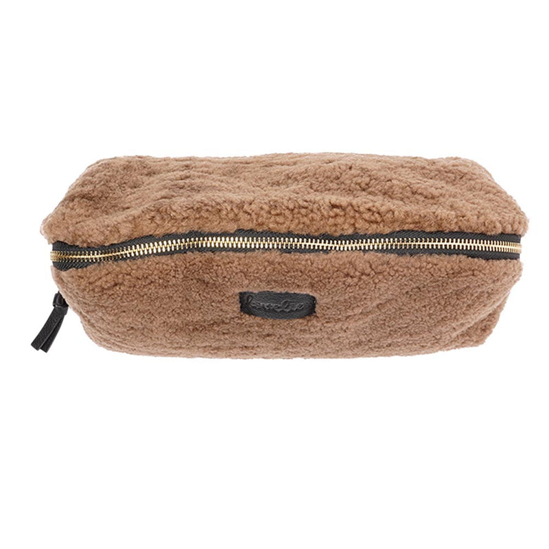 Lovelies Studio _ Wuttu is a mini clutch with a detachable wrist strap and is perfect for carrying your essentials with you. Wuttu is hand made from the finest curly shearling from Australia.   Top zipped closing   Detachable wrist strap   Satin lining and flat zipped inner pocket   Item comes with a branded dust bag.   Embossed Lovelies logo on the front   Gold-toned hardware   Measurements W26 X D2 X H12 cm   100 % Australian curly shearling 