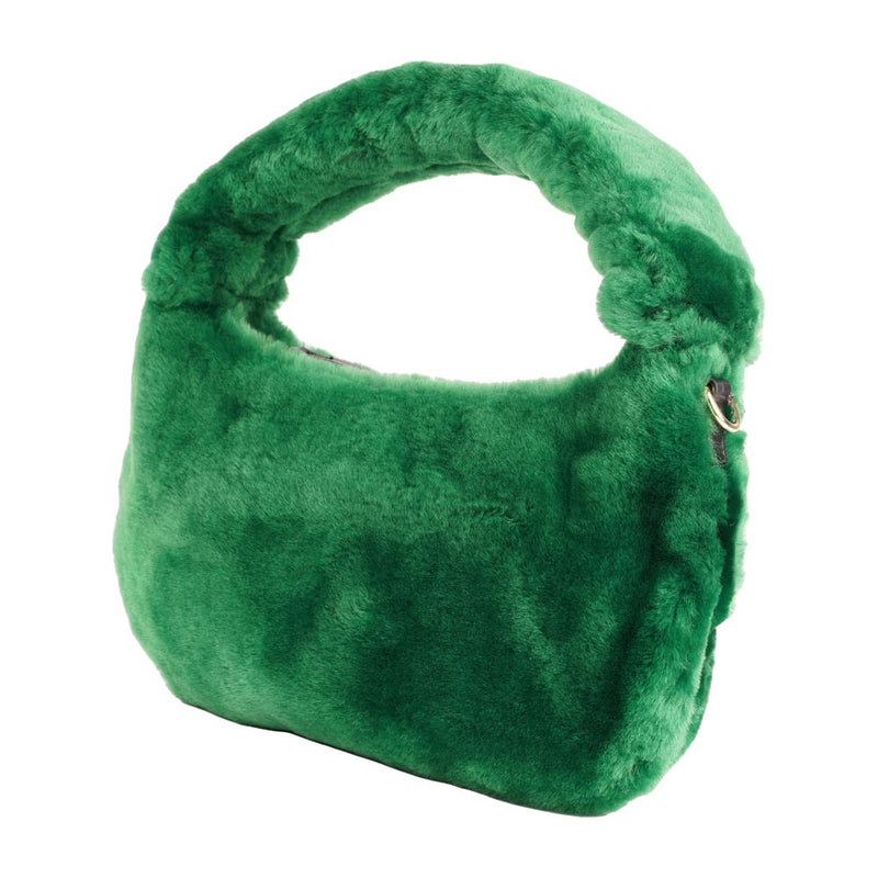 Lovelies Studio - Zhamo is a beautiful small shearling handbag which is perfect for carrying your essentials with you.  * Top handle in thick shearling   * Adjustable and detachable shoulder strap in leather   * Satin lining and flat zipped inner pocket   * Item comes with a branded dust bag.   * Gold-toned hardware   * Messurements W26 X D6 X H24 cm   * 100 % Australian shearling 